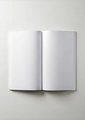 Fototapeta premium Open Blank Book on Plain White Surface in Minimalist Style