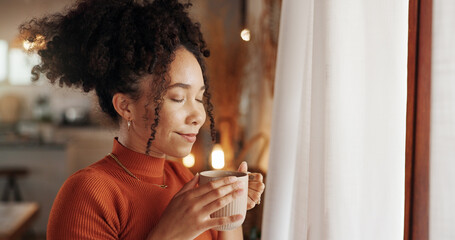 Aroma, coffee and wellness with face of woman in living room of home to relax for weekend. Fresh,...