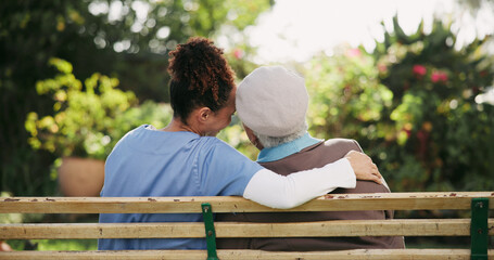 Caregiver, senior woman and hug on bench outdoor for nursing support, retirement and comic...