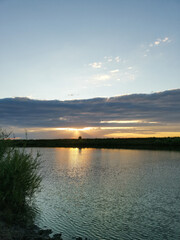 Lake with a tree in the background