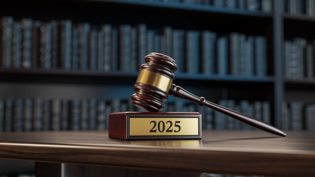 2025 : Judge's Gavel as a symbol of legal system and wooden stand with text word
