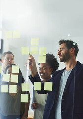 Idea, writing and business people in meeting for planning, discussion and brainstorming in office....