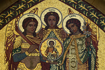 Mosaic of The three archangels, Saint Michael, Saint Gabriel, and Saint Raphael surrounding and...