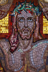 Mosaic of Face of Jesus Christ crucified on the cross with the crown of thorns. .