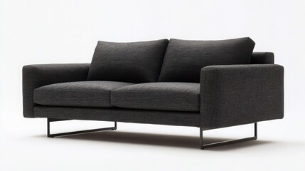 Obraz premium A modern minimalist sofa with slim metal legs and charcoal gray fabric, isolated on a white background 