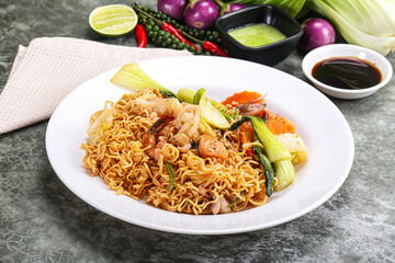 Asian cuisine - Fried noodles with seafood