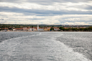 Naklejka premium Fazana in Croatia photographed from the ferry to Brijuni Islands