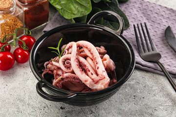 Marinated squid tentacles in the bowl