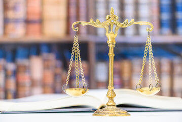 Legal office of lawyers, justice and law concept : Retro balance scale of justice on a desk in a...