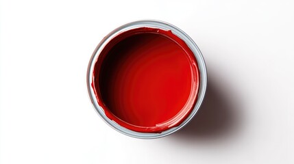 Red paint can isolated against a white background viewed from above