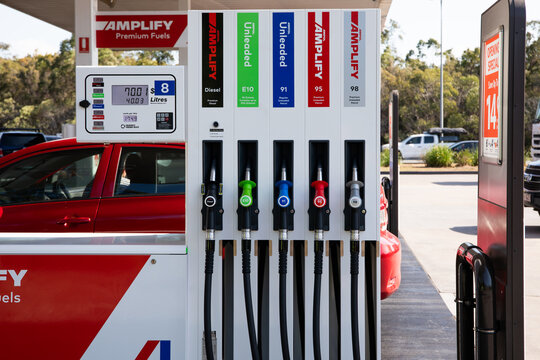 Retail fuel petrol gas station pump dispenser bowser car truck filling diesel canopy red