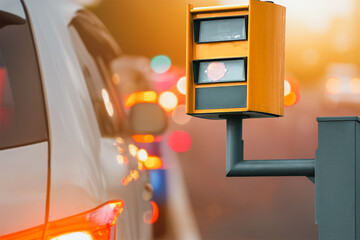 Evening road monitored by speed enforcement camera