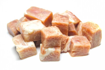 diced raw beef isolated on white background