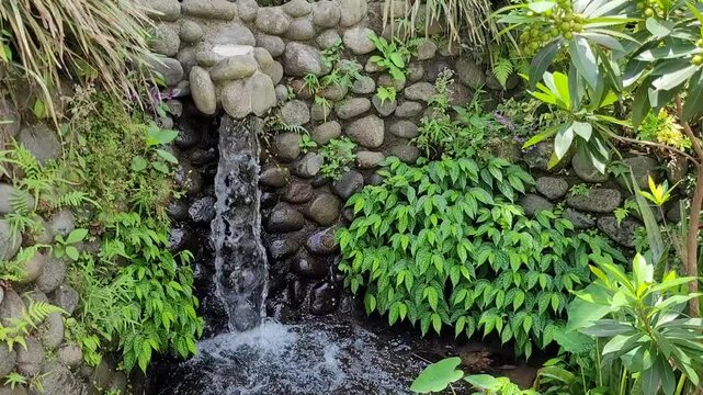 a view of mini waterfall