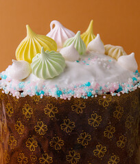 Colorful meringue topped celebration cake