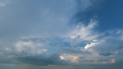 Obraz premium Ominous clouds slowly drift across sky. Dark stormy cloud motion big stormy rain day. Timelapse.