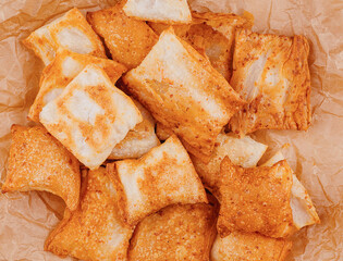Delicious puff pastry squares laying on baking paper