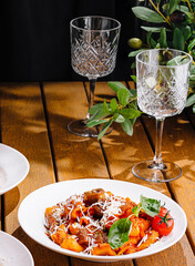 italian pasta on rustic wooden table