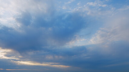 Sky different shades sunset. Dramatic blue, colorful clouds. Sunset sky with clouds background. Timelapse.