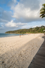 Portrait shot of Noosa main beach footpath towards the national park in Noosa Heads, Queensland, Australia