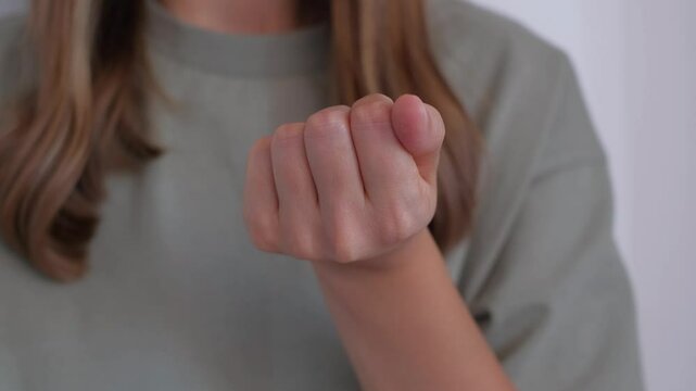 Girl holding pills in her hands, close-up. Treatment of colds during the disease season, healthy lifestyle