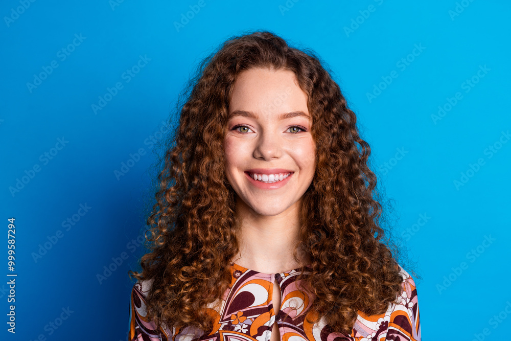 Poster Photo portrait of attractive young woman look camera toothy smile dressed stylish colorful clothes isolated on blue color background