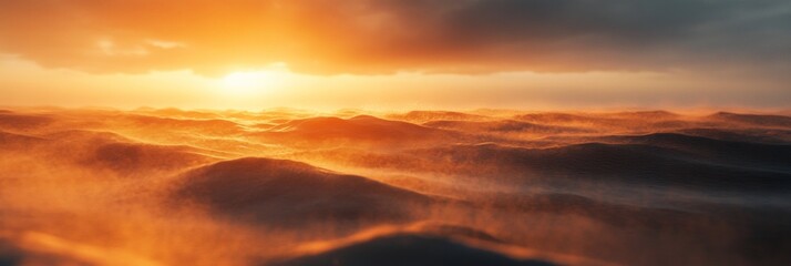 Fototapeta premium Wind-swept sand dunes at sunset, sharp textures contrast with a softly blurred sky, evoking serene beauty in a vast landscape.
