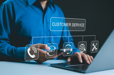 Customer Service Concept. Businessman interact with digital icons representing customer service...