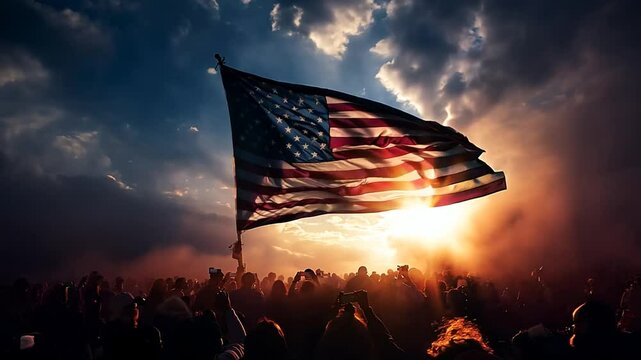 Celebration event with an American flag waving in the midst of a glowing celebration with fireworks
