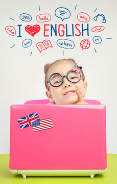Beautiful cute little girl with eyeglasses using laptop computer. Illustrations and I love English phrase above her head. Foreign language learning concept.