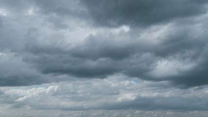 Thunder clouds before or after rain time. Dark storm clouds change shape. Timelapse.