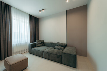Close up grey pillows on sofa at living room	
