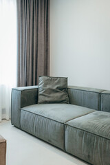 Close up grey pillows on sofa at living room	
