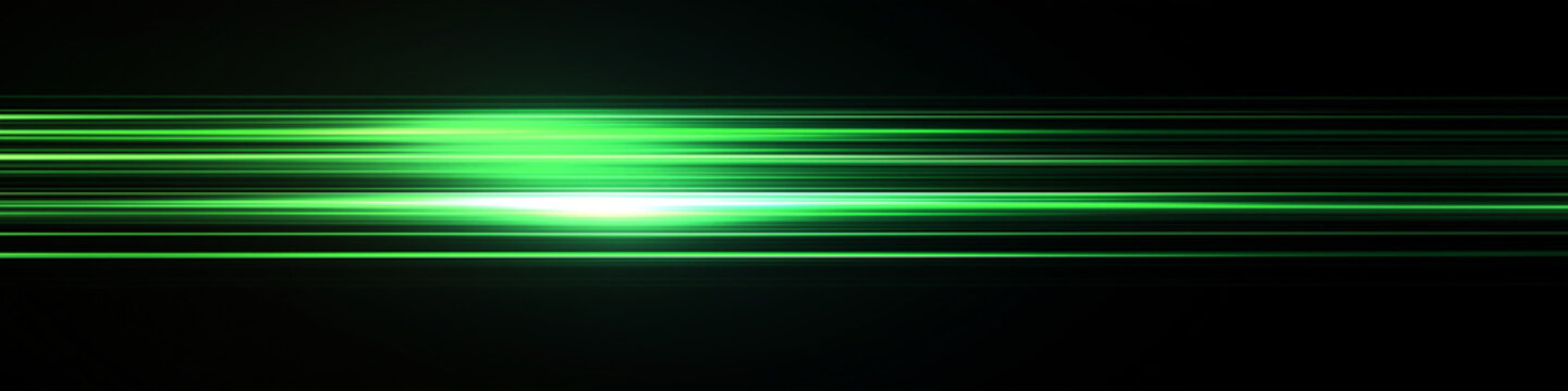 Green light streaks on a black background with glowing horizontal lines in a high speed motion blur effect.