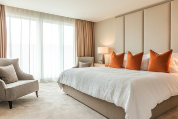 Modern Scandinavian Bedroom with Large Bed, Two Stylish Armchairs, and Panoramic Countryside View