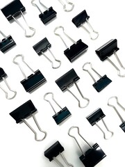 Obraz premium Paper clips on a white background.