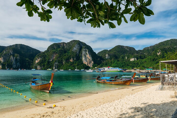 boats and tourist cruise on andaman sea at Phi Phi Don island, Krabi