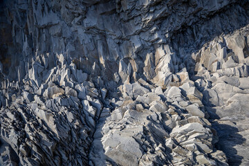 basalt rock formations in the evening lights, Reynisfjara beach, Vík, South Coast, Iceland