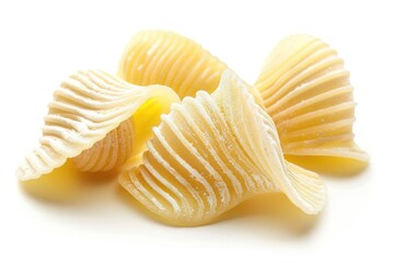 Three pieces of pasta on a clean white surface, perfect for food or culinary photography
