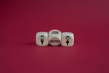 Cube with the words 'logic' and 'emotions' between a male and a female figure. Beautiful red background.