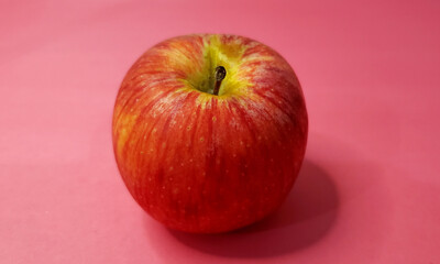 One apple on pink white background - Healthy Fruits