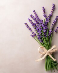 Fototapeta premium Bundled Lavender Stems on Weathered Paper Background
