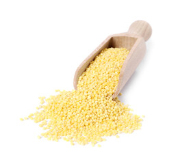 Millet groats in wooden scoop isolated on white