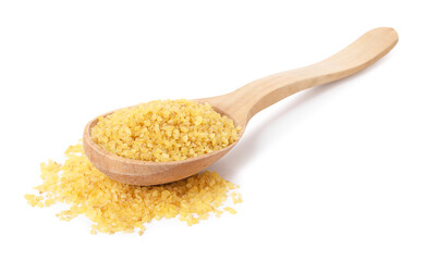 Raw bulgur in wooden spoon isolated on white