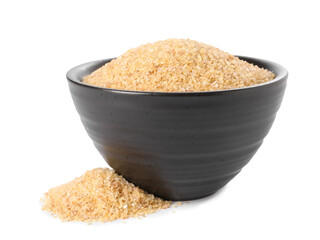 Raw wheat groats in bowl isolated on white