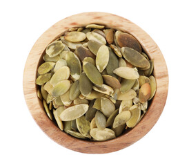 Peeled pumpkin seeds in wooden bowl isolated on white, top view