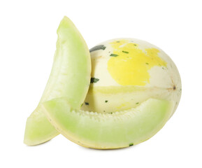 Whole and cut fresh ripe honeydew melons isolated on white