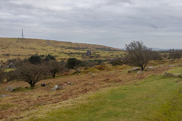 Grey cloudy day at Minions on Bodmin Moor and Wheal Jenkin Mine in the distance
