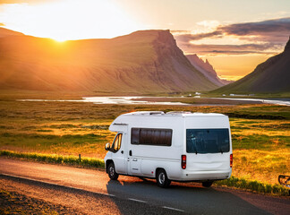 Obraz premium Tourists in RV Motorhome Camper Van on a Scenic Mountain Road Trip 