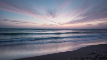 Fototapeta premium Stunning beach scene at sunset with soft waves, tranquil water, and pastel sky colors ideal for themes of relaxation and nature